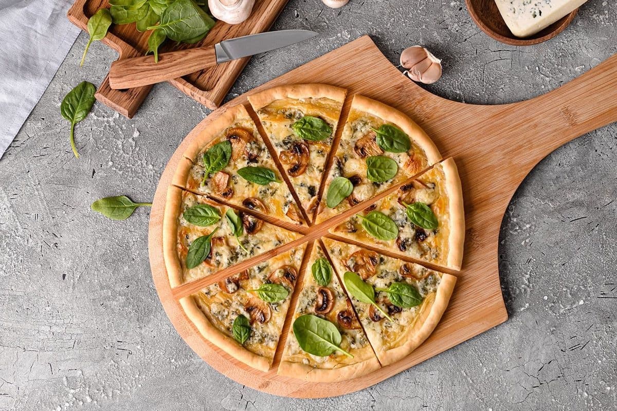 Pizza is one of the foods most likely to spike blood sugar. Here are easy ingredient swaps for a tasty pizza that’s better for metabolic health.